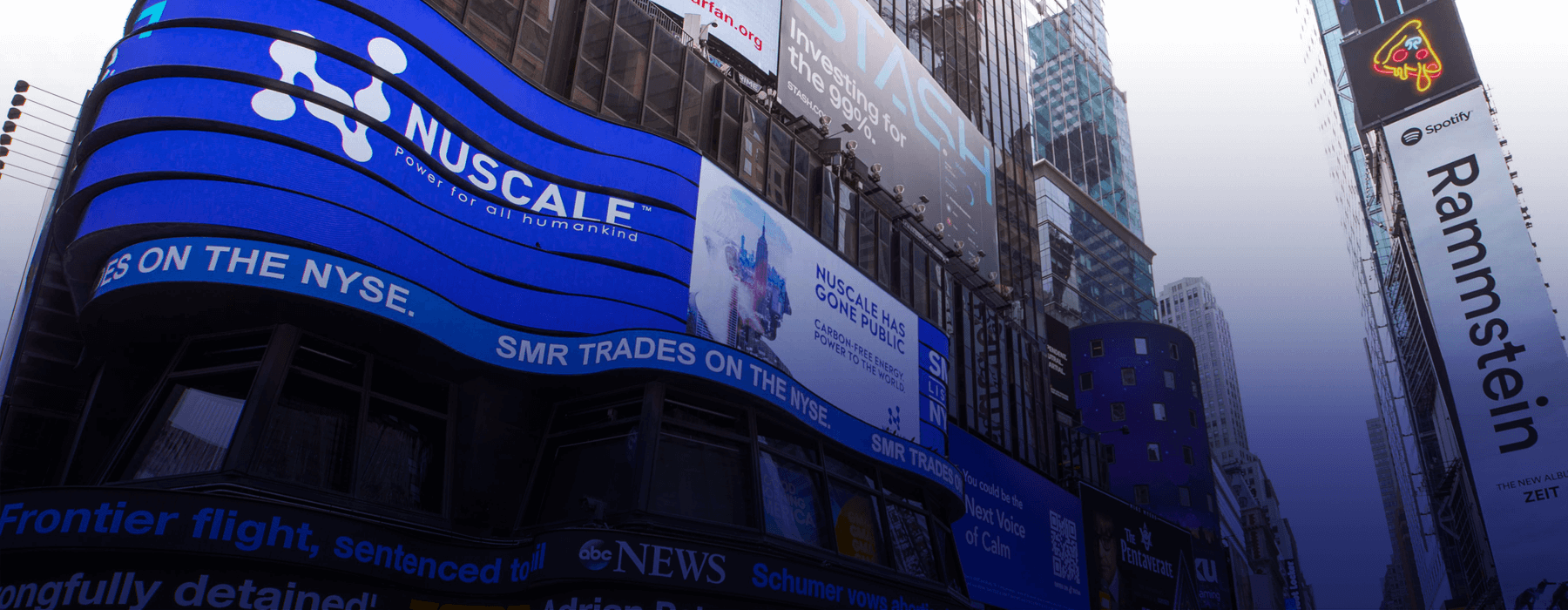 Exterior of NYSE with Nuscale on the billboard. 