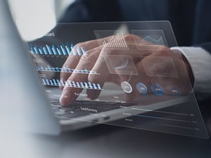 Close up of person using laptop.