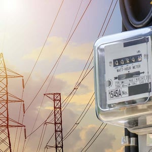 Power lines with a close up of a meter.